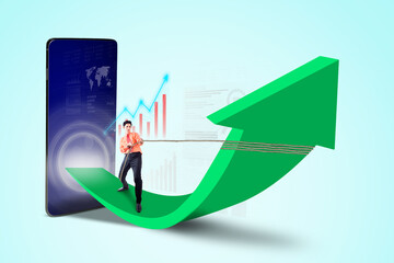 Businessman is pulling arrow sign with with a big screen phone and charts