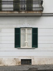 Old colourful window with shutters in Italy. Traditional European, Italian architecture. Summer travel