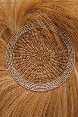 Close up view of decorative boho style straw plate