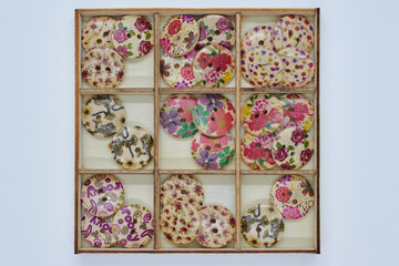 Wooden box with printed buttons