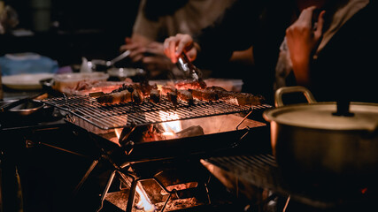 BBQ in camping. concept of Travel and relaxing in holiday.