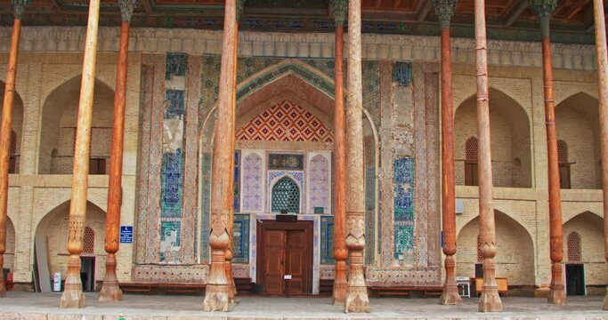 Ancient architectural complex Bolo-Khauz on a sunny day. Bukhara, Uzbekistan.