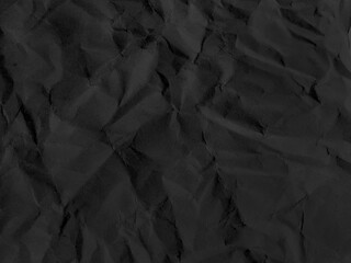 black wrinkled paper texture. crumpled paper