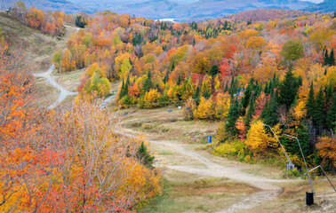 Ski lift and ski slope in autumn. View from Mont Tremblant summit. Quebec. Canada.