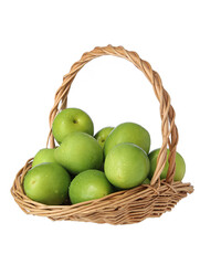 A basket of fresh fruit dates on a white background