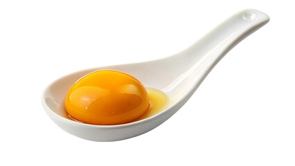Egg yolk on white spoon isolated on transparent