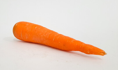 Fresh carrot heap vegetables isolated on white	

