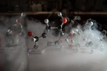 Smoky experiments with molecular model. Scientist working on chemical reaction, generating thick...