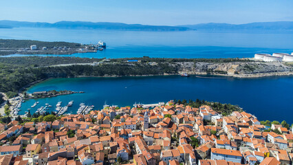 Omišalj, a charming old town perched on a cliff overlooking the Adriatic Sea, is situated on the...