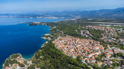 Omišalj, a charming old town perched on a cliff overlooking the Adriatic Sea, is situated on the...