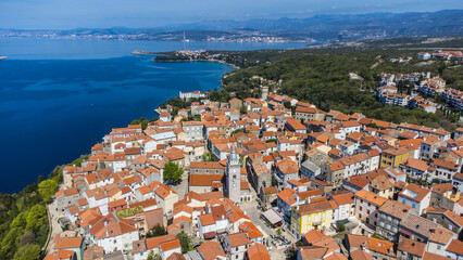 Omišalj, a charming old town perched on a cliff overlooking the Adriatic Sea, is situated on the...