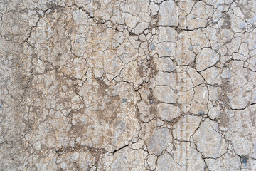 dry soil arid or ground and land crack broken to drought on area lacks water by top view from El Niño or La Niña for agriculture and floor texture background - obrazy, fototapety, plakaty