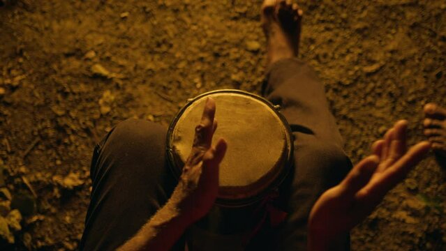 Darbuka Drumming Goblin Drum near a fire