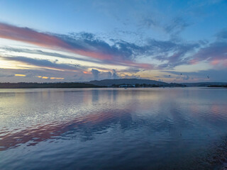 Sunrise, clouds, blue sky and water - a perfect day