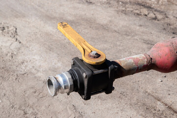 Used industrial hydraulic shutoff  valve outdoor closeup