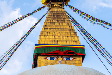 buddha eyes at tibetan style stupa - 778830043
