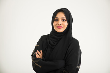 Arabic woman with abaya in studio - 778831297