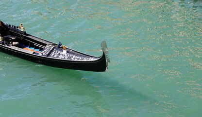 Bow of a gondola the iconic tourist boat sailing the Grand Canal in Venice Italy