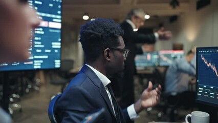 Mixed-race brokers disagreement issues in work. People in formal clothes monitoring charts and discussing about financial or banking trading. Business partners frustrated by bad decision or investment