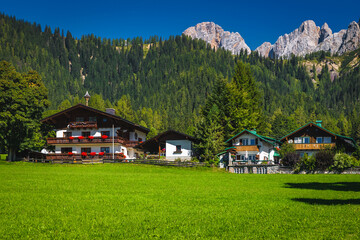 Fototapeta na wymiar Alpine village with cute houses in the Alps, Austria