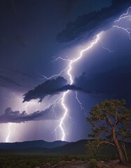 Naklejka na ściany i meble A striking photograph capturing the raw power of nature as multiple lightning bolts pierce the night sky above a solitary tree on a hill