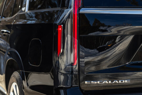 Novosibirsk, Russia - March   18, 2024 : Black Cadillac Escalade , Close up detail on one of the LED taillights modern car.