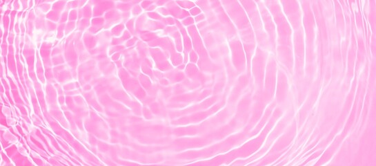 Pink water wave texture background. Reflection of Sunlight in pink water surface with ripples and splashes. Natural summer vacation banner. Beauty background for skin care cosmetics advertisement