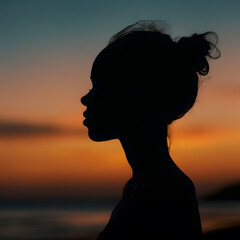 silhouette of a person in the sunset