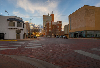 Sun setting on a old brick street in downtown, Lubbock, Texas, United States