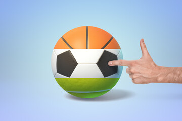 Pointing at a colorful segmented soccer ball