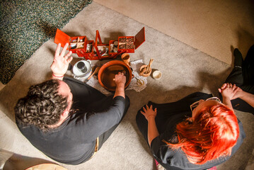 overhead shot of the shamans preparing the cocoa for the ceremony