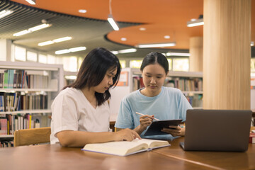 Two young woman, a dedicated student, navigates university life with her friend, embracing education and growth as they pursue their goals together. female student in college