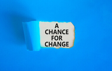 A chance for change symbol. Concept words A chance for change on beautiful white paper. Beautiful blue background. Business A chance for change concept. Copy space.
