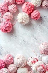 Banner with pink and white yarn on a white background. Vertical photo with copy space top view.