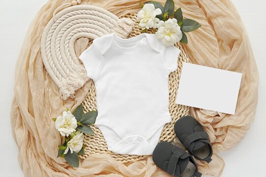 Pregnancy, baby waiting announcement template for social media, place for text, white baby bodysuit and card mockup for ultrasound photo, aesthetic flat lay.