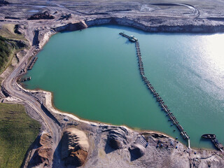 Gravel pit aerial perspective Panoramic landscape excavation lake water
