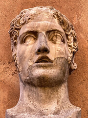 Captivating stone sculpture portrait head or bust of a worn out statue in Rome, Italy - 778926234