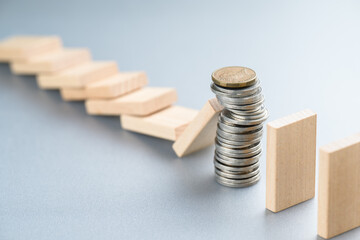 Money heap coins as solution to stop the impact of domino effect, and succeed