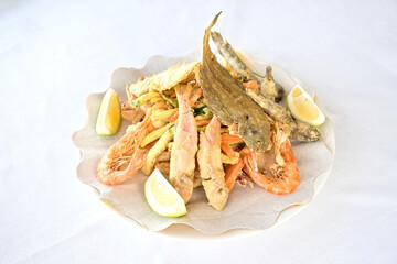 Mixed fried fish from Adriatic Sea in the Conero Mount regional Park near Ancona marche region Italy