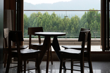 View of the wooden table and benches in the cafeteria