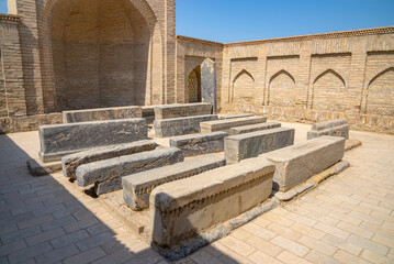 A courtyard with old graves (XVII century). The city of the dead is Chor Bakr. The surroundings of Bukhara. Sumitan, Uzbekistan