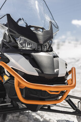 snowmobile in the winter mountains - 778950294