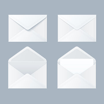 Four white envelopes arranged in various positions on a gray background