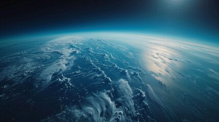 Stunning high-altitude view of Earth's atmosphere and curvature with sun reflecting off the ocean,...