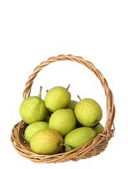 A basket of green fresh fruit pears