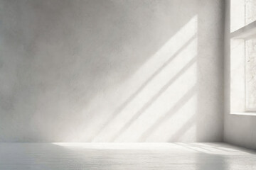 Texture wall of gray and white concrete with shadows and light falling from the window to the right