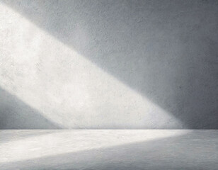 Geometric beam of light from a window on a gray textured wall