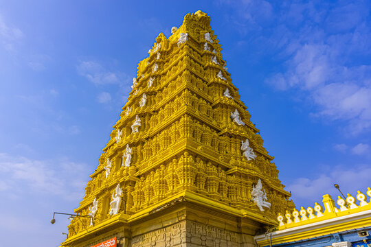 Chamundeshwari Temple is a Hindu temple located on the top of Chamundi Hills about 13 km from the palace city of Mysuru in the state of Karnataka in India. The temple was named after Chamundeshwari.