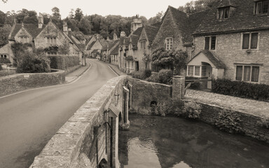 Quaint village street in the Cotswold area of England