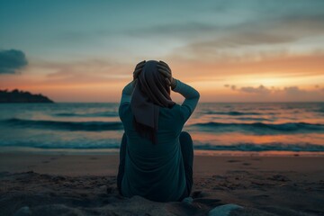 A girl having depression episode, alone by the beach road - obrazy, fototapety, plakaty